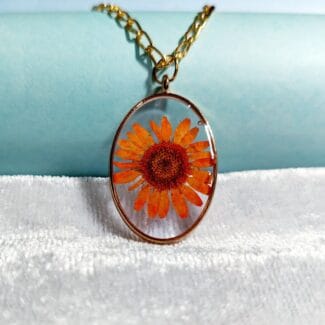 Amber Petal Pendant Close-up of daisy flower