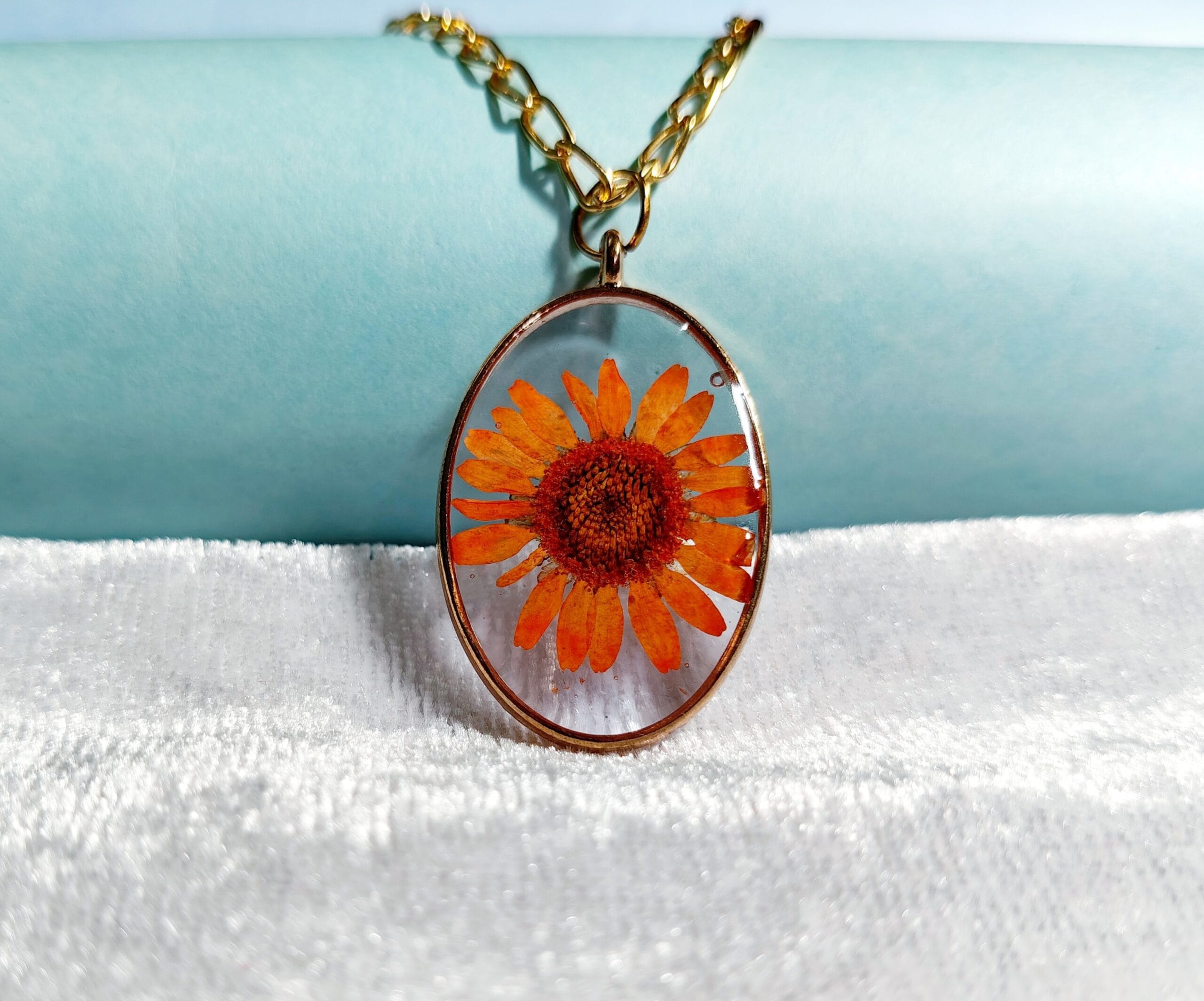 Amber Petal Pendant Close-up of daisy flower