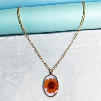 amber Petal Pendant with chain displayed flat
