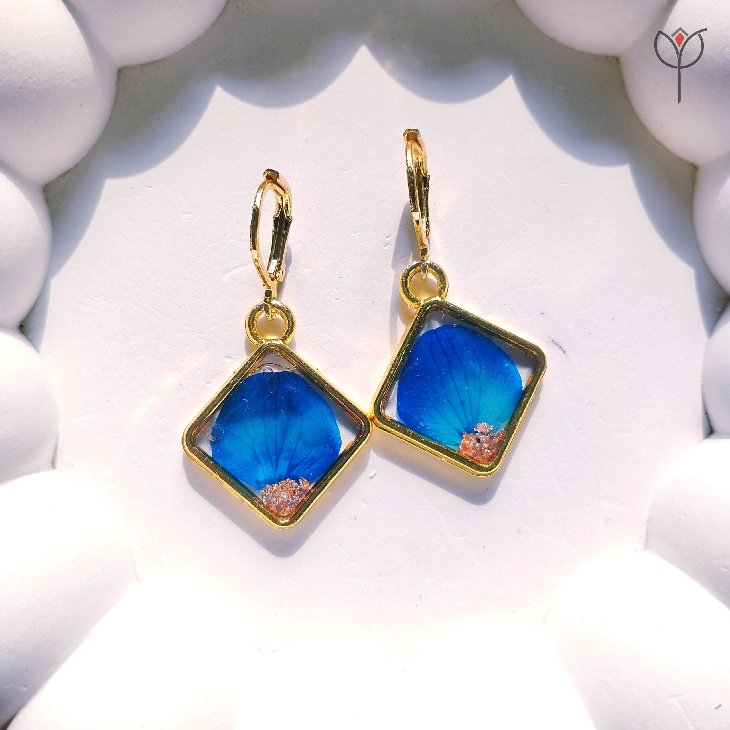 Blue Whisper Drop Earrings with real blue flower preserved in clear resin