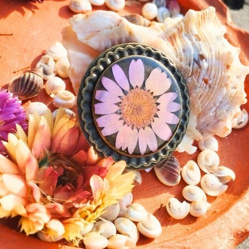 Close-up of Blush Daisy Ring handmade with real flower