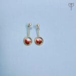 Blush Ember Earrings in full frame
