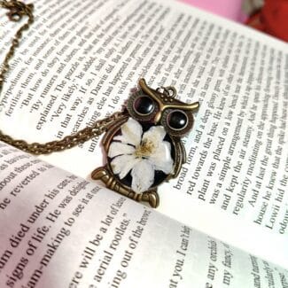 BotaniOwl pendant featuring real flower preserved in resin