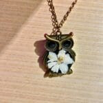 Wearing BotaniOwl pendant – owl design floral necklace