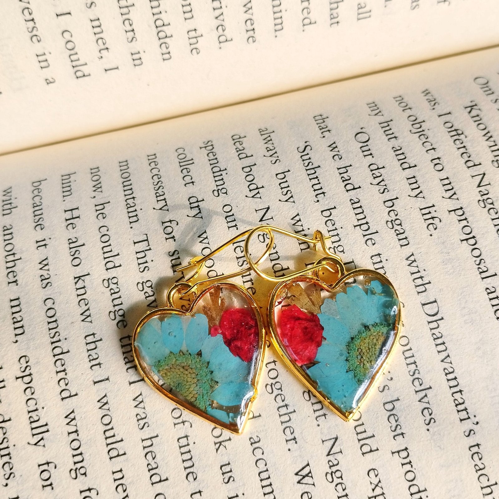 Close-up of Floral Heart Resin Earring handmade with flowers