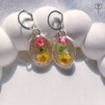 Medley Bloom Earrings hanging in natural light