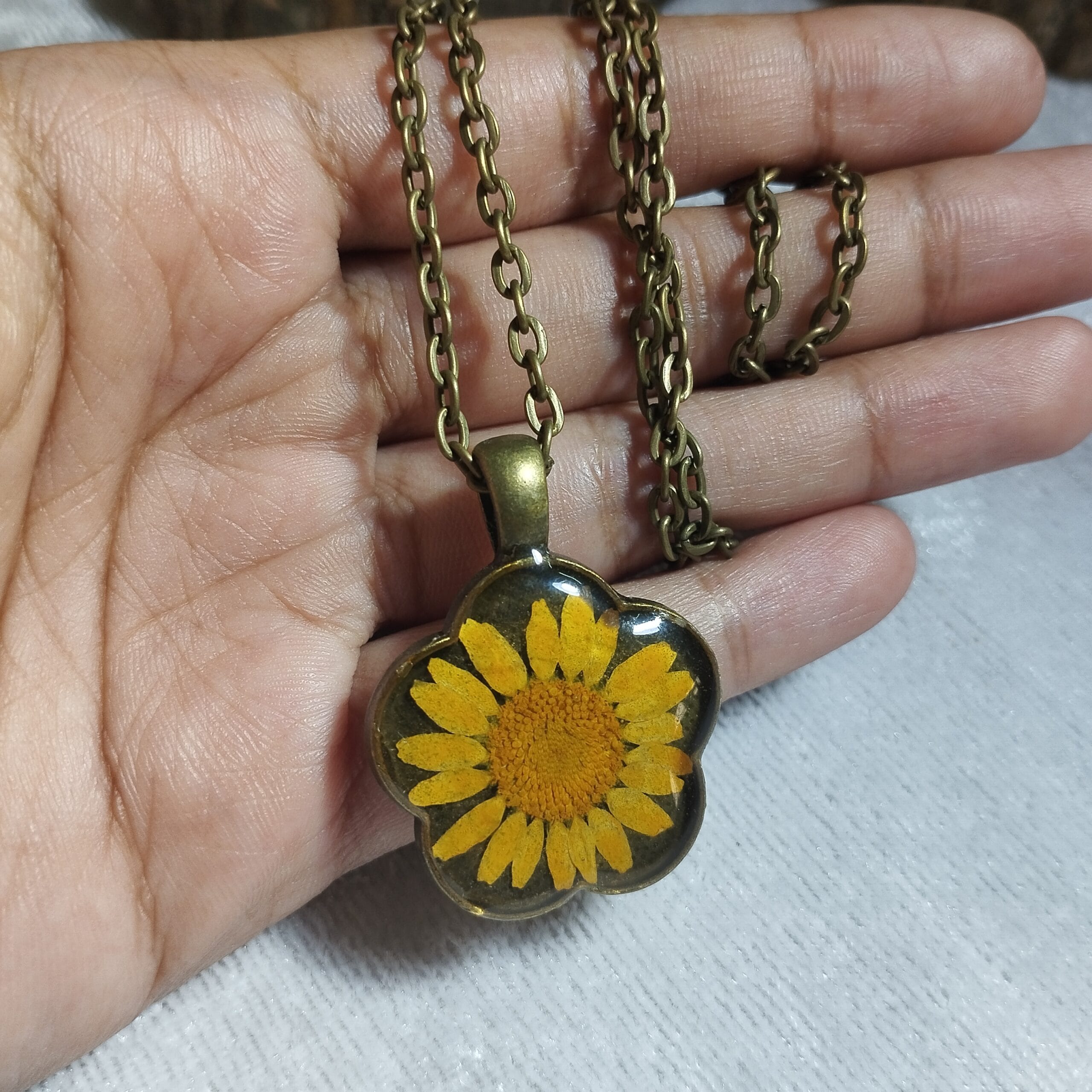 Close-up of Sunny Daisy Pendant