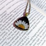 Close-up of handcrafted triangle pendant