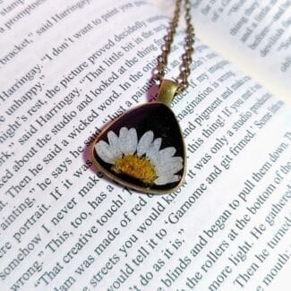 Close-up of handcrafted triangle pendant