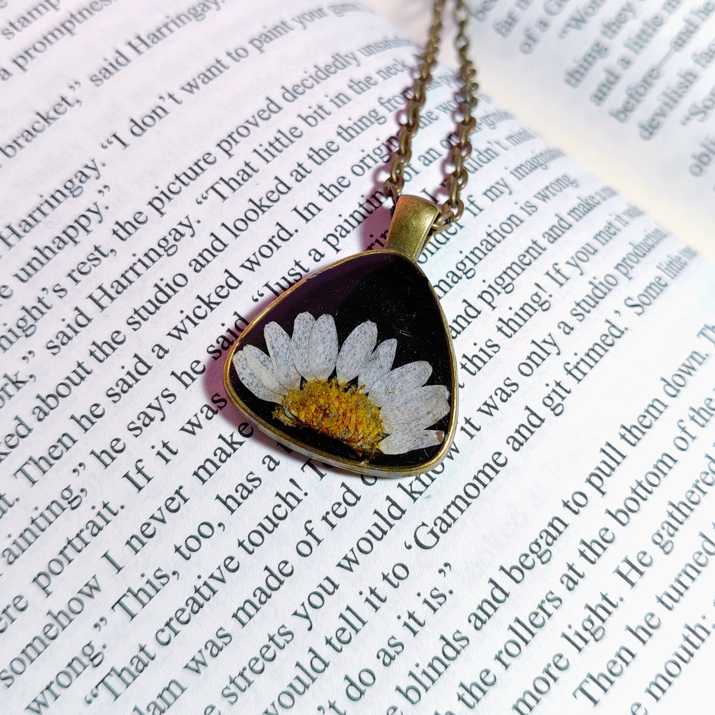 Close-up of handcrafted triangle pendant