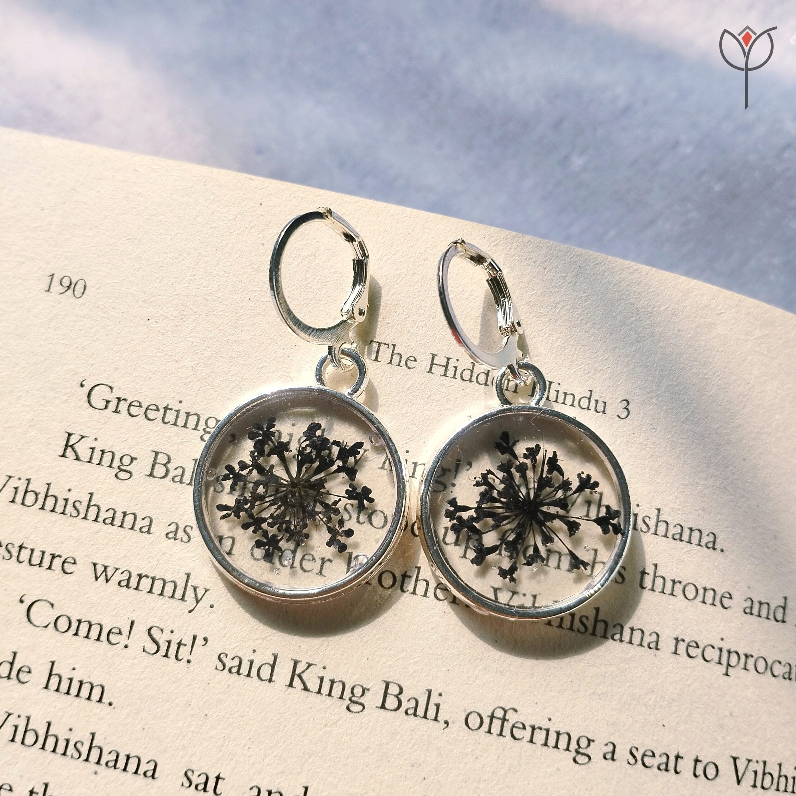 Close-up of Winter Lace Earrings showing delicate lace flower detail