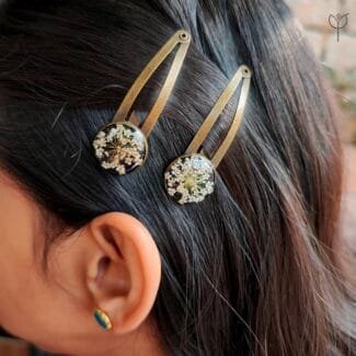 Anne Lace resin hair clips styled with dried flowers
