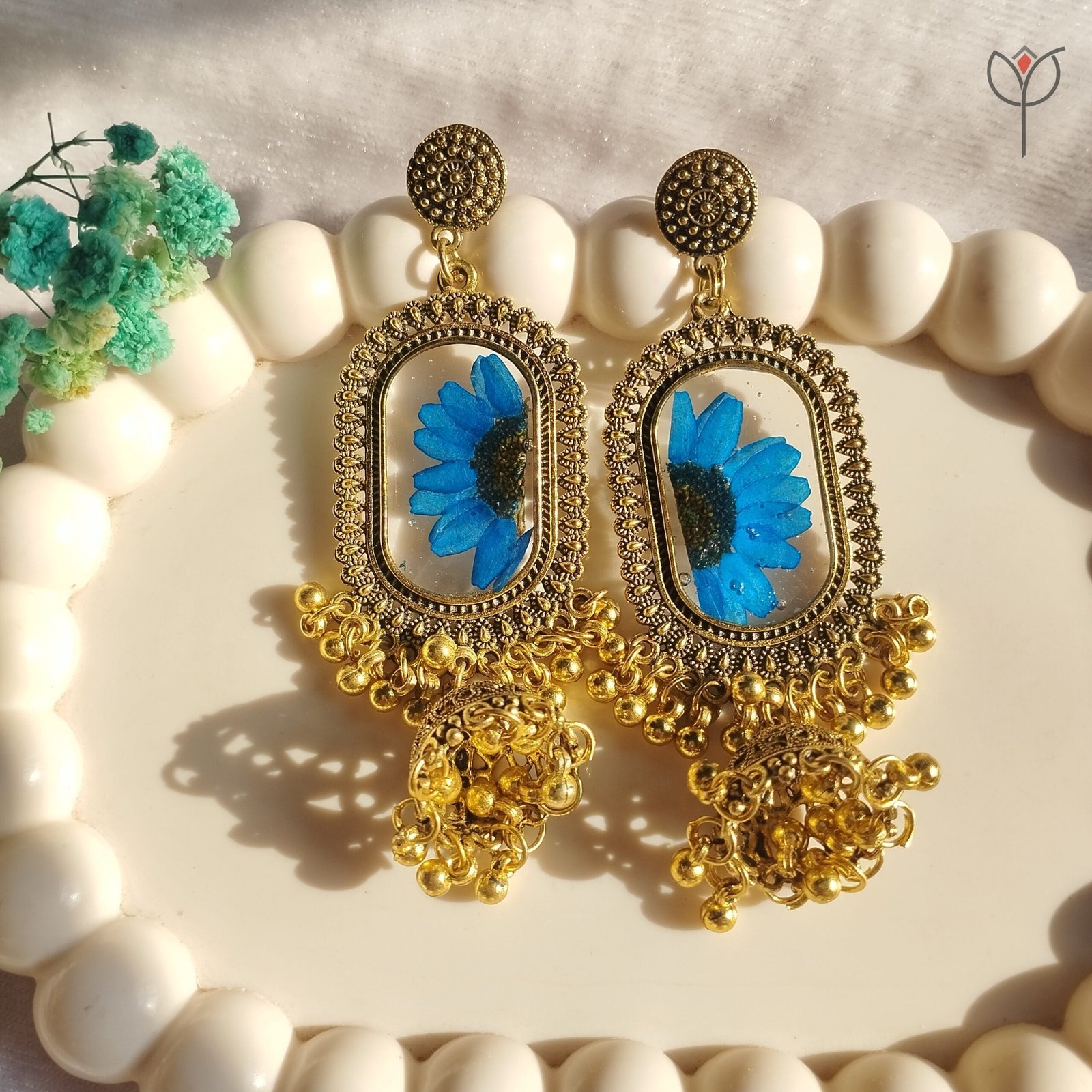 antique-gold-bluebell-daisy-jhumka Real blue daisy floral resin jhumka