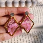 Real flower Blush Lace Daisy Earrings in gold frame