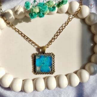 Handmade cerulean blue resin pendant