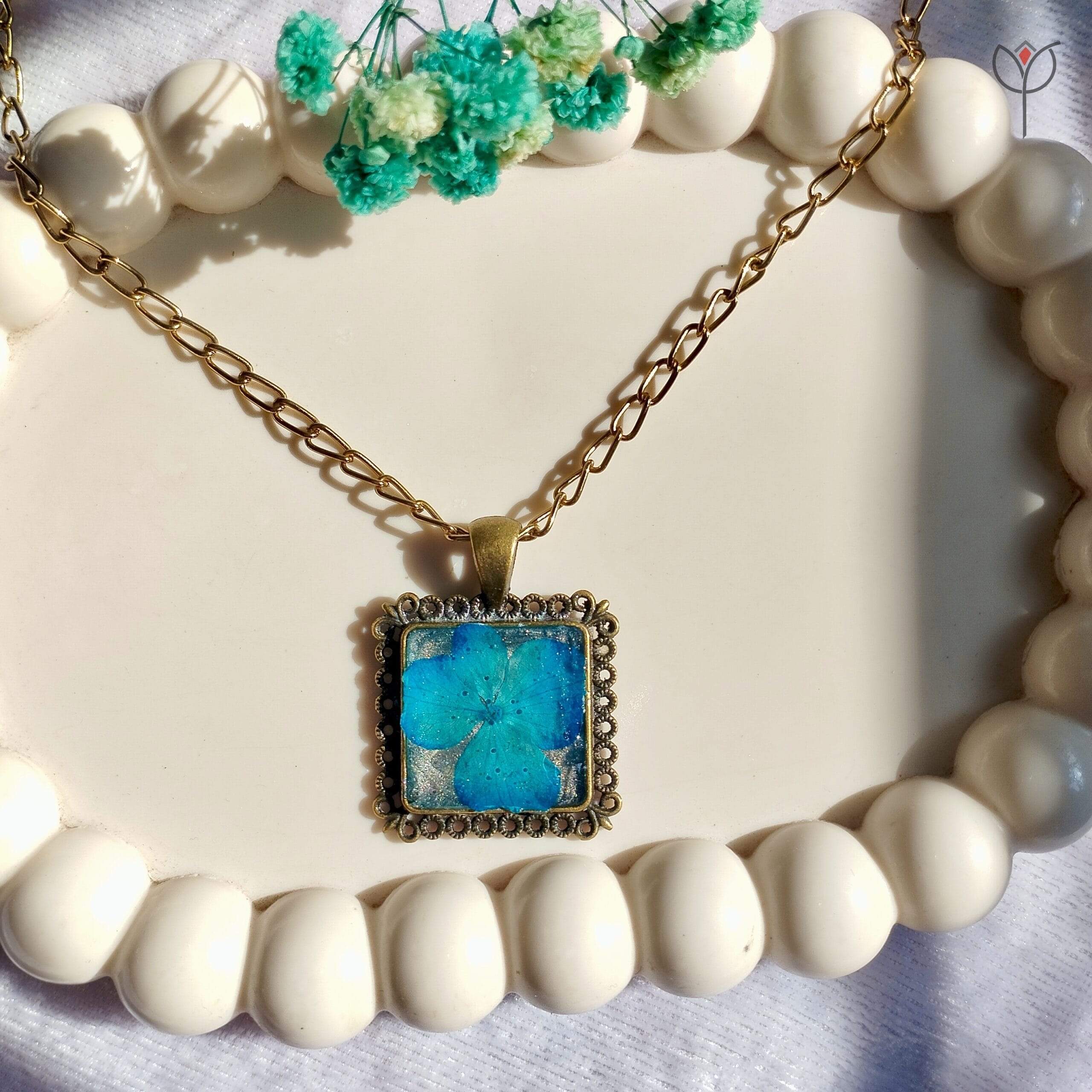 Handmade cerulean blue resin pendant