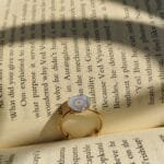 Minimal floral Golden Promise Ring featuring a real flower