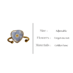 Delicate golden ring with real forget me not flower