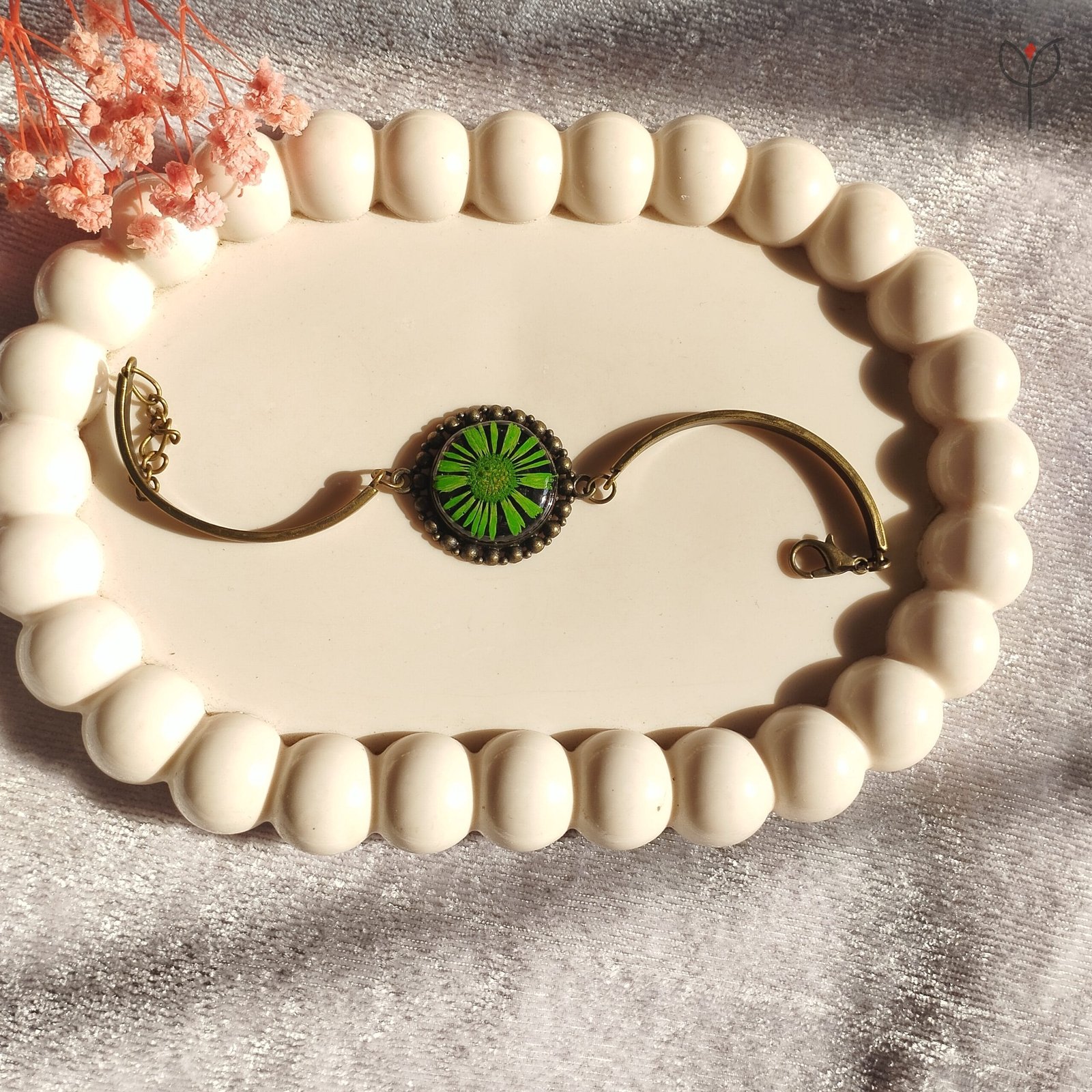 Handmade resin bracelet featuring preserved green aster