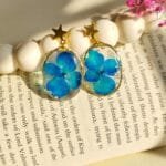 Minimal blue resin drop earrings with real flower
