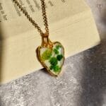 Handmade floral heart pendant green baby’s breath in resin