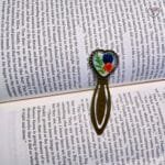 Vintage metal heart bookmark with preserved flowers and fern
