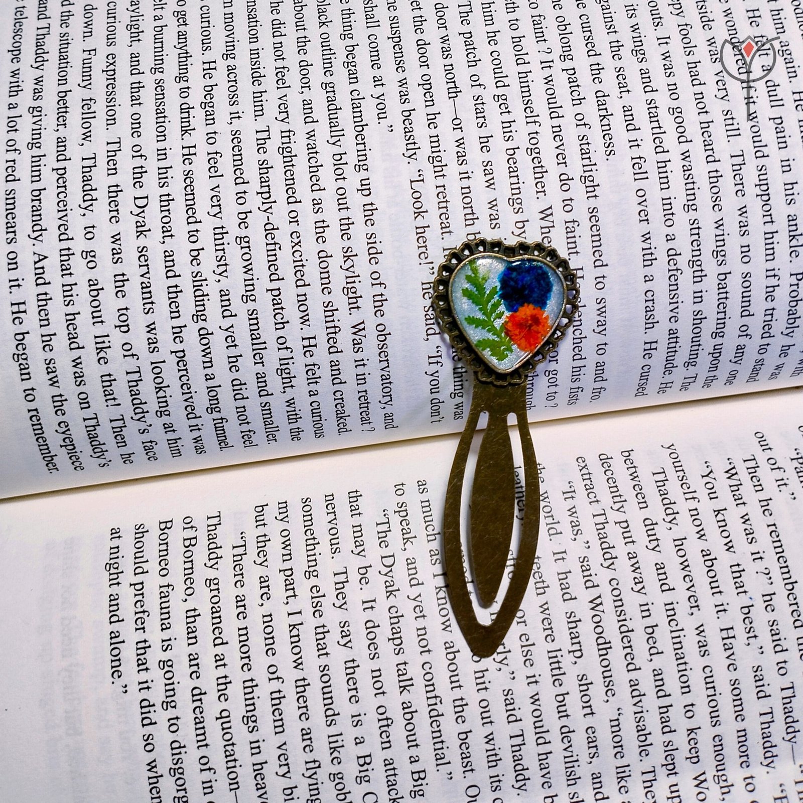 Vintage metal heart bookmark with preserved flowers and fern