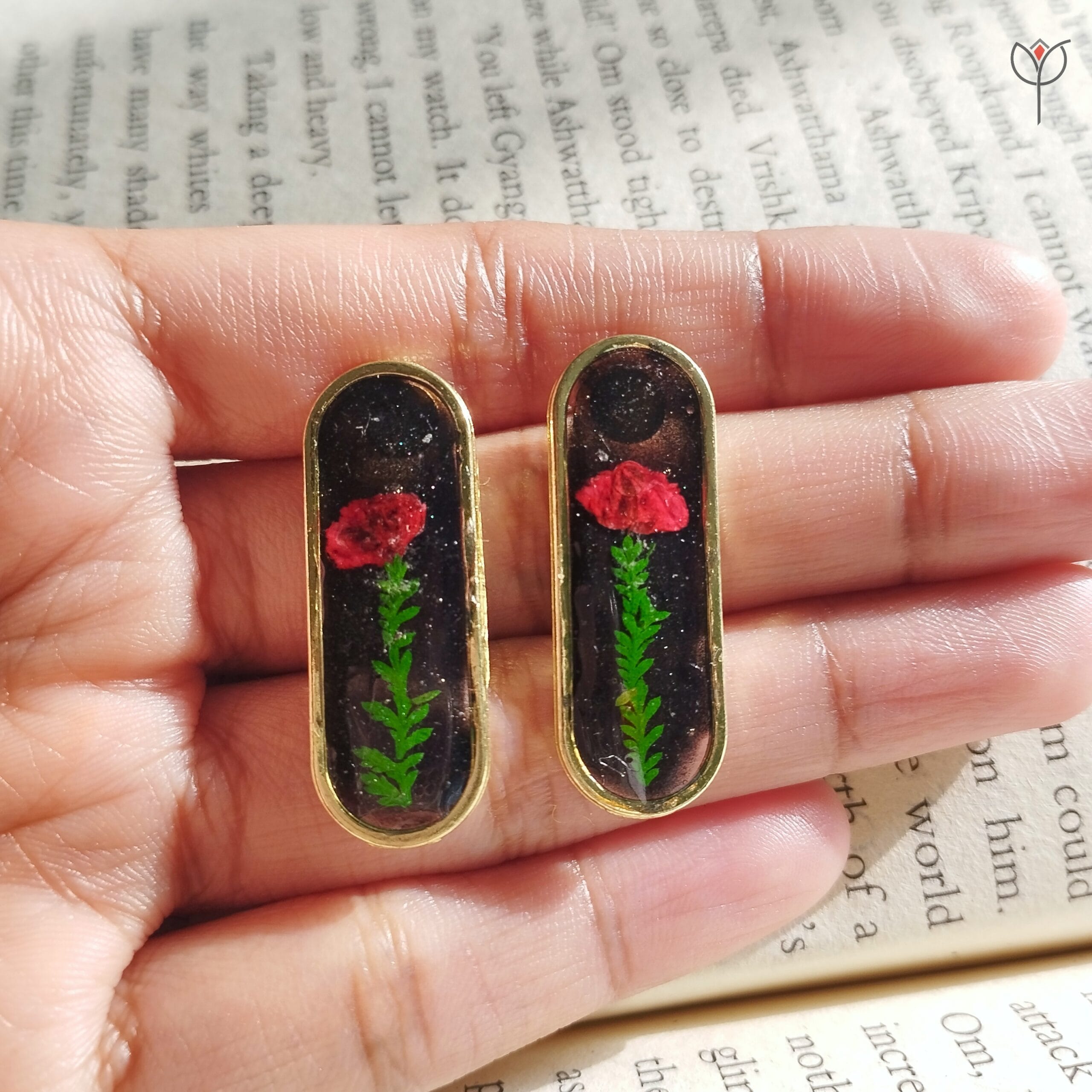 Close-up of Leafbound resin earrings showcasing