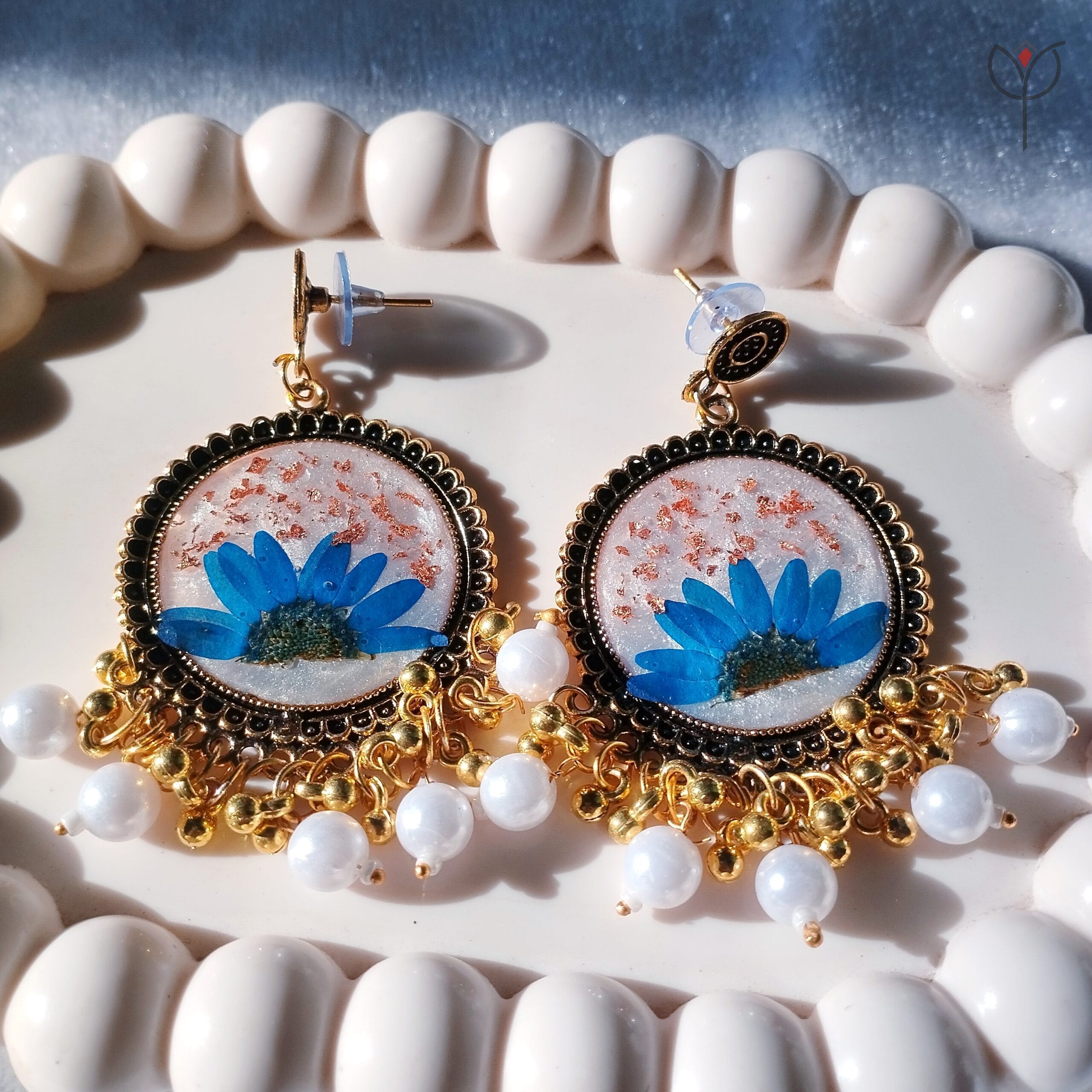 Neel Mayuri Jhumka with preserved blue flower