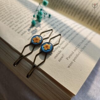 Pressed Time resin clips with dried plum flower