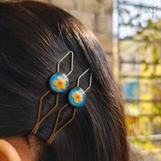 Floral resin hair clips made with real dried plum flower