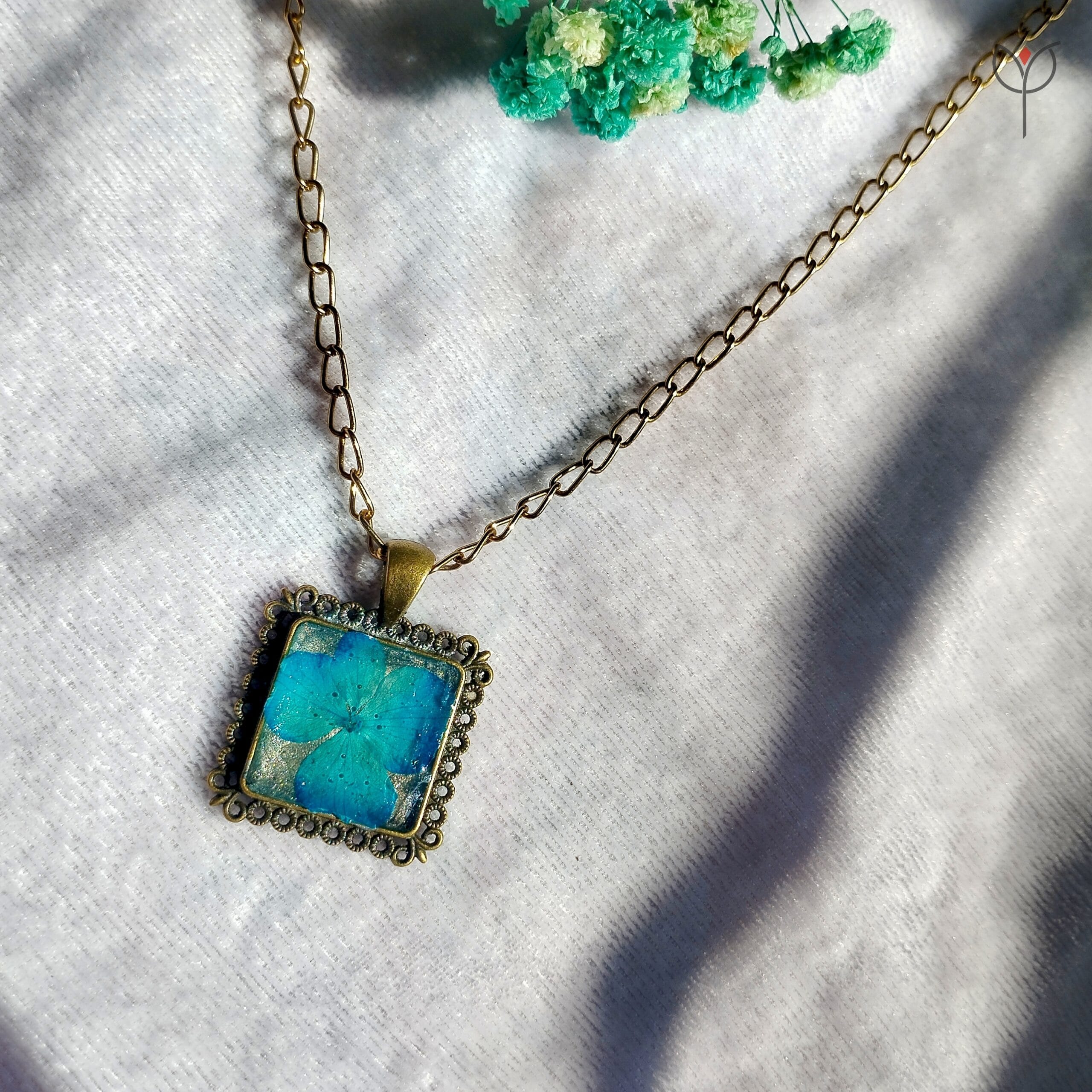 Botanical cerulean resin pendant