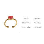 Minimal golden resin ring with a soft red dried flower inside