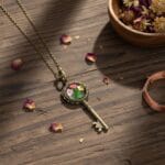 Vintage key pendant featuring real plum