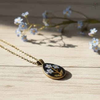 Vintage style teardrop pendant featuring real
