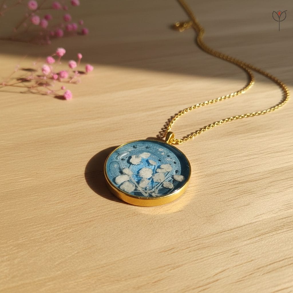 Handcrafted resin pendant with baby’s breath