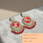 Kundan jhumka with red daisy and pearl drops