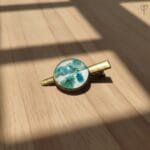 Driftveil resin hair clip with teal baby’s breath flowers