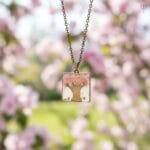 Handmade resin pendant with flower tree