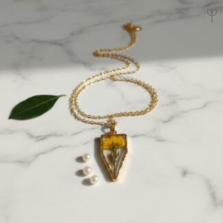 Golden Dawn Pendant featuring preserved yellow daisy