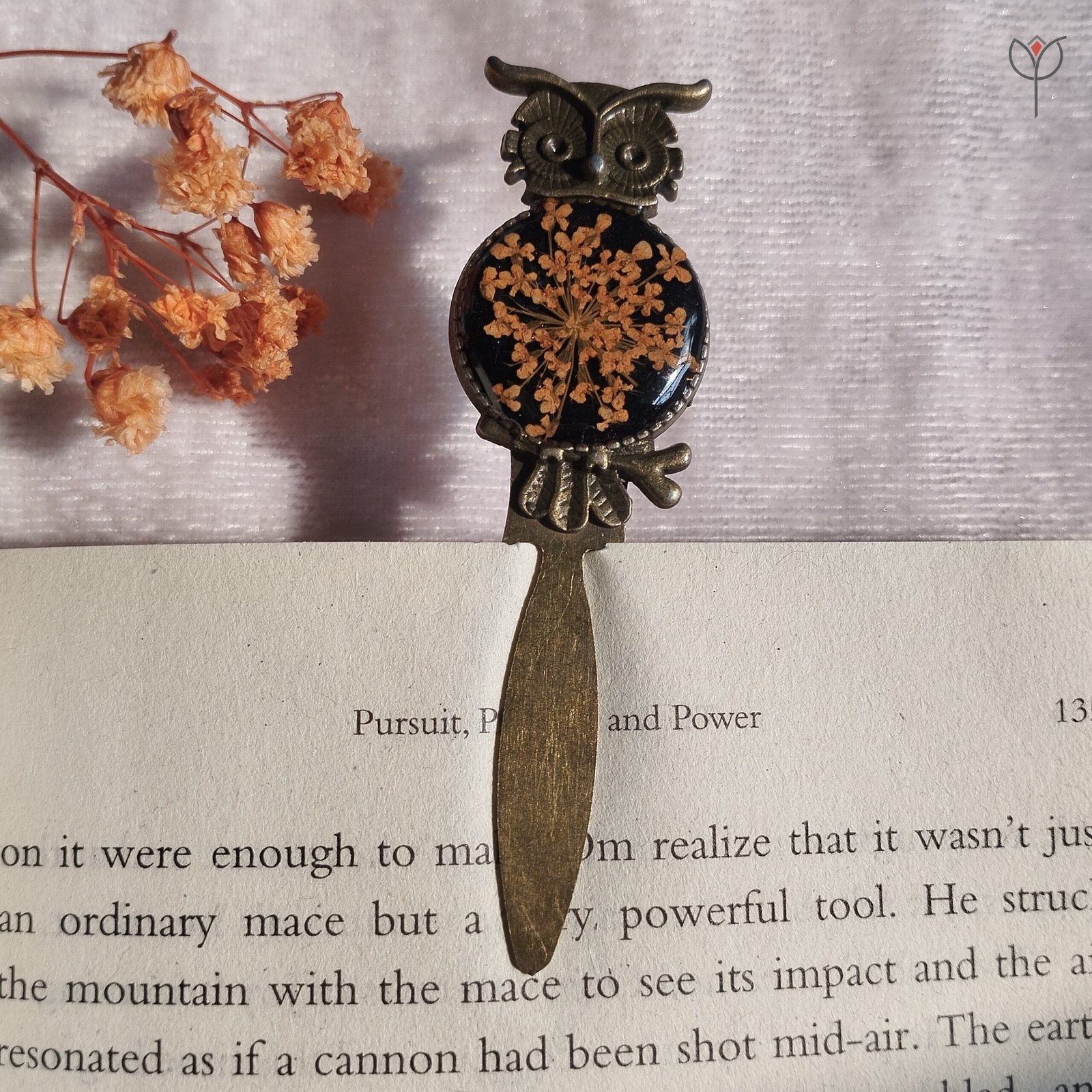 Decorative owl-shaped bookmark with real flower