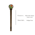 Antique-style bookmark with pressed plum flower