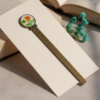 Lacebound Pages Bookmark made with dried plum flower and Queen Anne’s lace