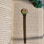 Floral resin bookmark with dried plum bloom and Queen Anne’s lace