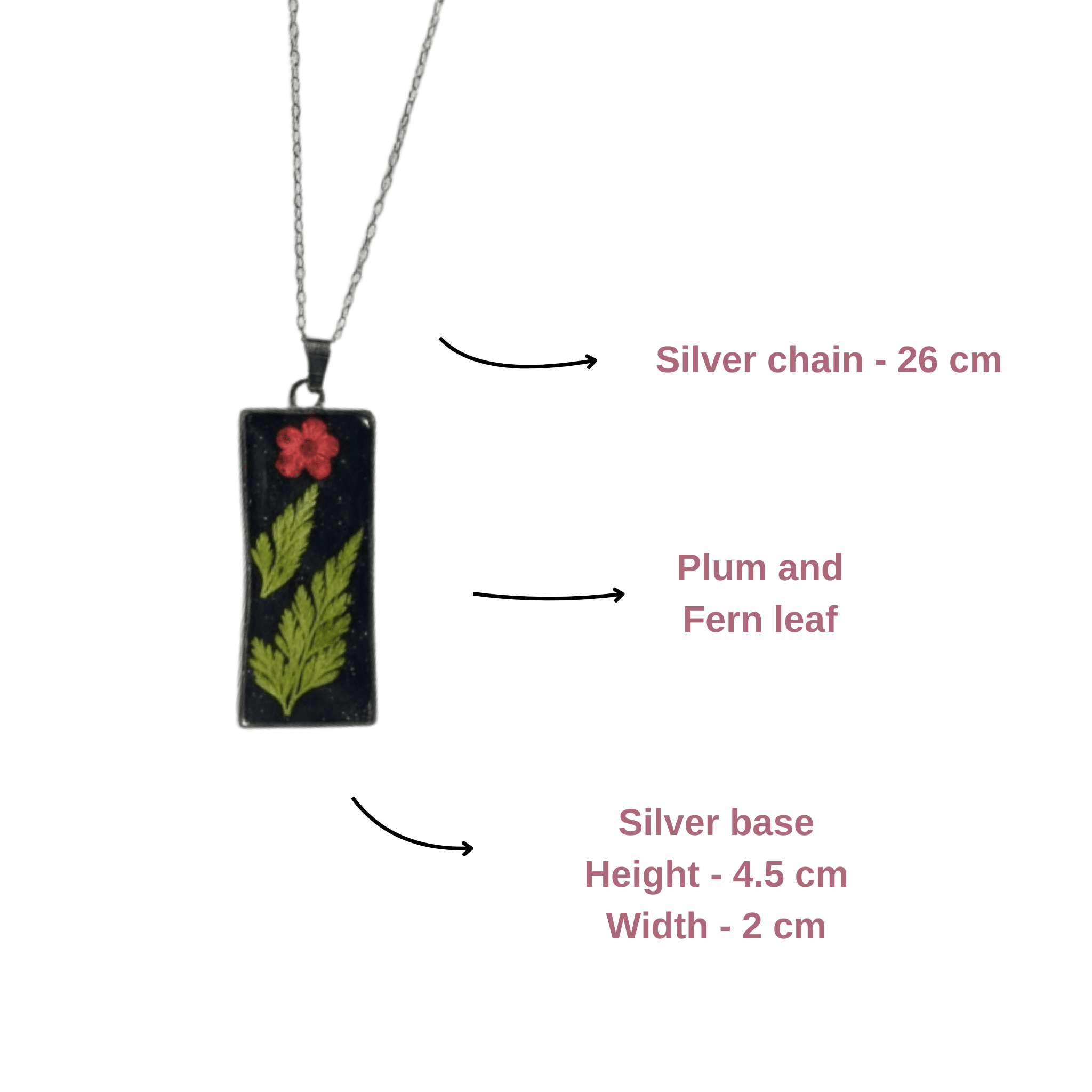 Minimal silver pendant with fern leaf and dried red flower