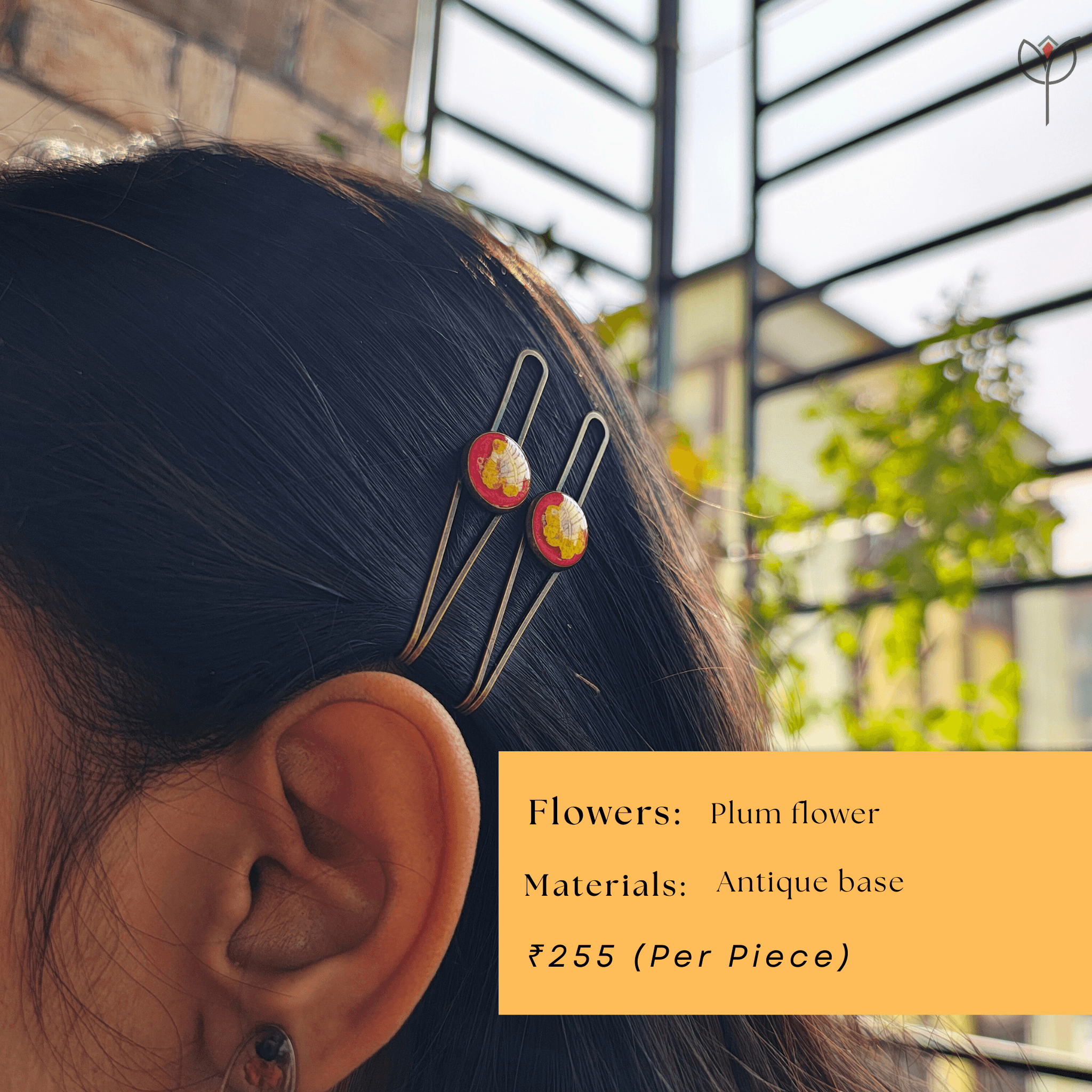 plum-resin-hair-clips-flower-detailing Close-up detail of dried plum flower