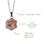 spring blooms set in polished silver base