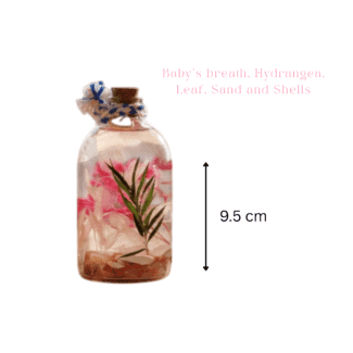 Close-up of hydrangea and baby’s breath preserved in mineral oil