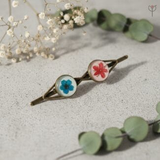 Twin Ember Bloom hair clip with red starburst bush