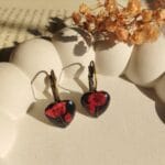 Antique base black heart resin earrings